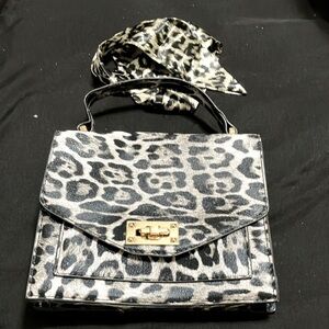 NWT ladies black and white mini purse with a tie